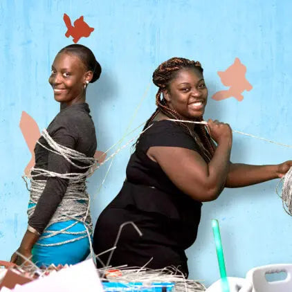 REECII staff at workshop having fun playing with braided straw