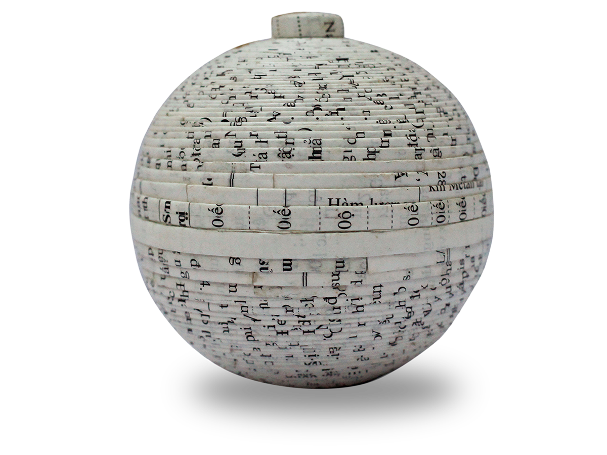 Product features a ball made from recycled magazine paper. As these products are made from recycled materials, they will always look slightly different from each other.