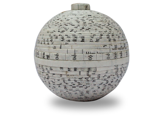Product features a ball made from recycled magazine paper. As these products are made from recycled materials, they will always look slightly different from each other.